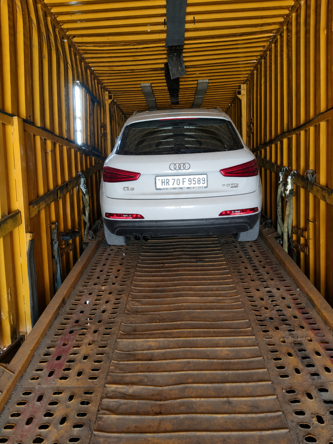Audi Q3, ready to roll in our enclosed carrier.