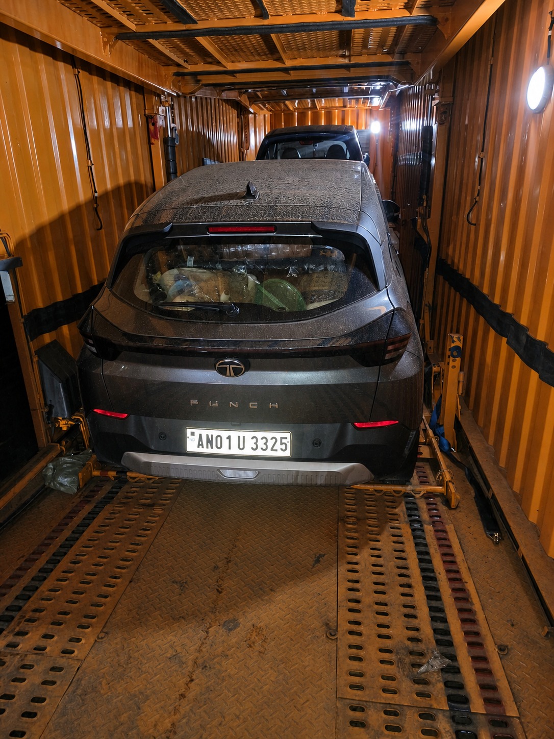 Tata Punch, upper deck, on a two-car container run.
