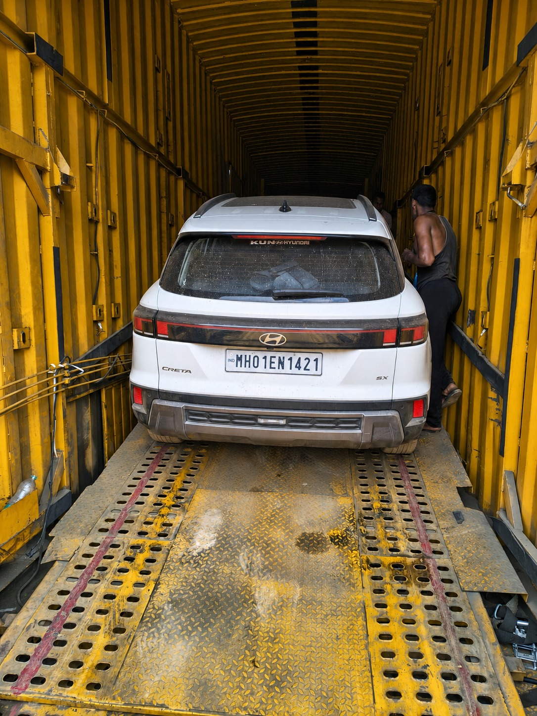 Hyundai Creta, backed into the container and lined up on the ramp.