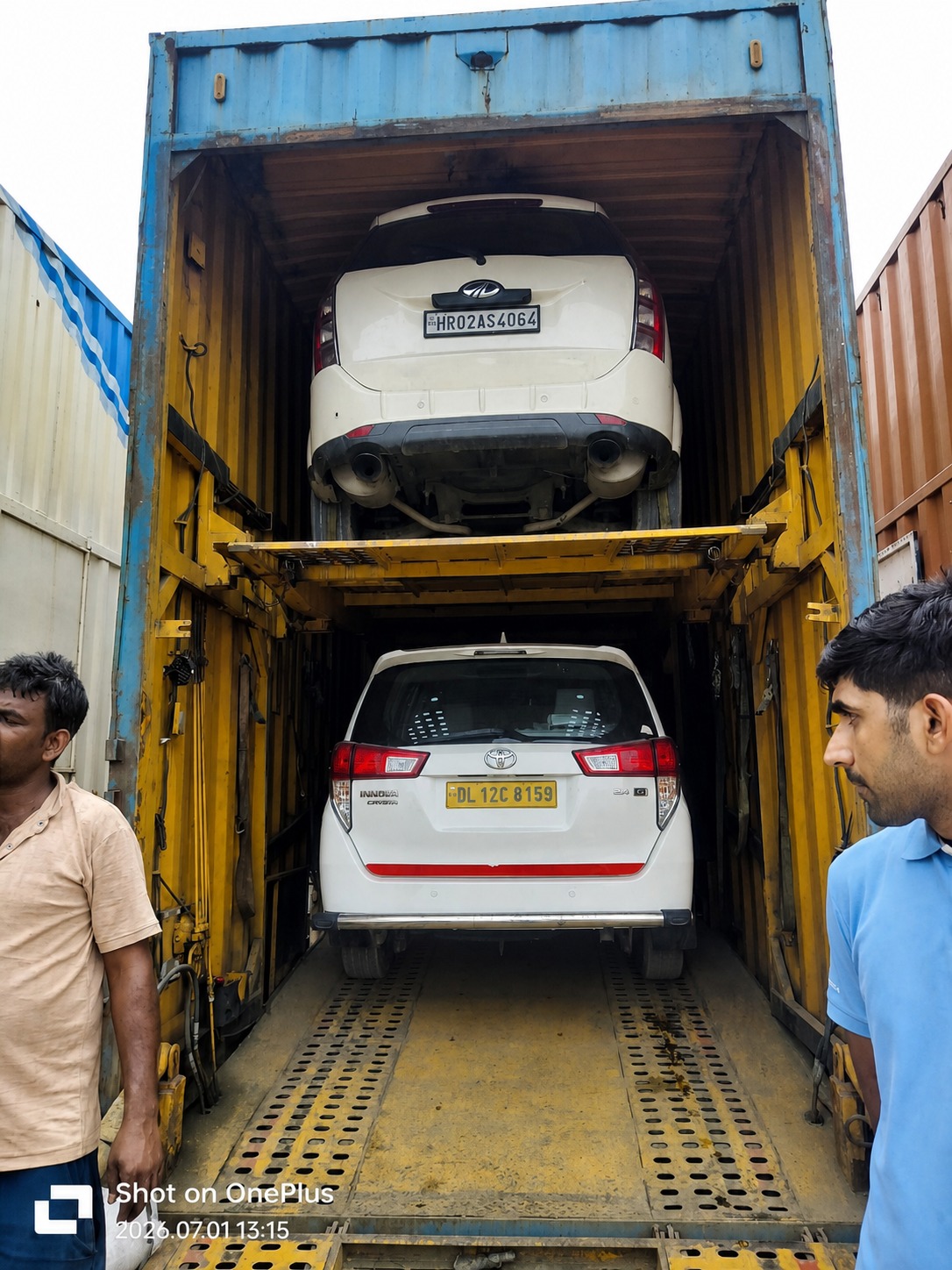 Our loading crew lining up an Innova Crysta and a Mahindra SUV for the same run.