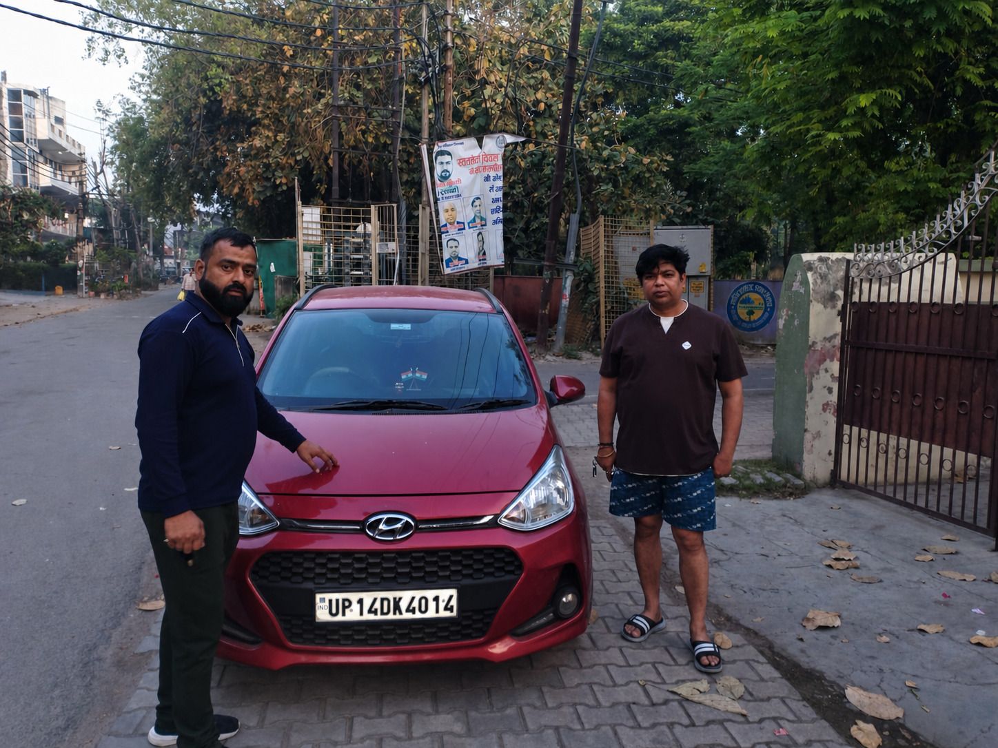 Hyundai Grand i10, handed over on a quiet residential street.
