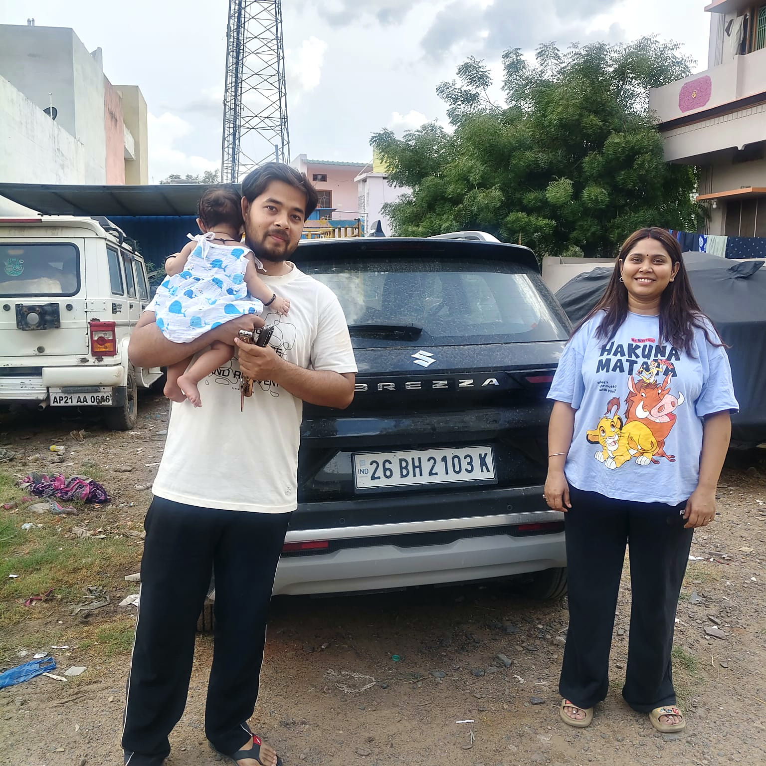 A family collecting their Maruti Brezza - deliveries don't get better than this.